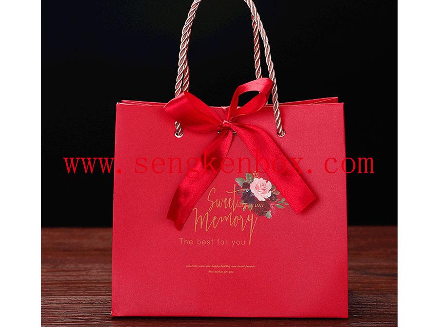 Red Festive Paper Case With Ribbon
