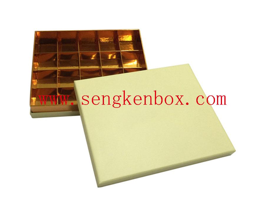 Chocolate Separates Inside Golden Foldable Box